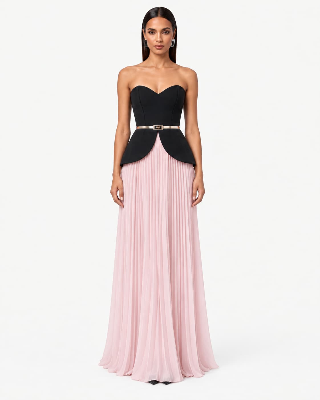 Front view — model in a strapless black peplum bodice over a blush pleated floor-length skirt.